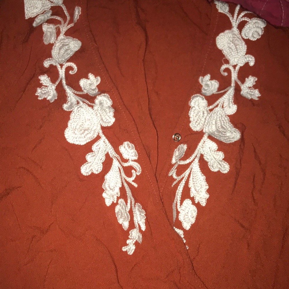 Orange top worn